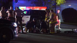 First-responders working on the e-biker hit by two vehicles in Vista on Thursday night
