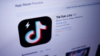 This photograph taken on April 11, 2024, in Paris, shows the logo of the Chinese social network application TikTok Lite displayed in Apple’s App Store. The social network TikTok, owned by the Chinese company ByteDance, has launched a new application in France and Spain, called TikTok Lite, which allows its users to get paid by watching videos, it announced on April 10, 2024. Users aged 18 or older can “collect points by discovering new content or completing certain actions,” the social network said.