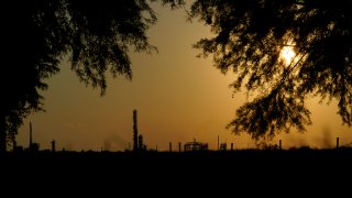 FILE - The Denka Performance Elastomer Plant sits at sunset in Reserve, La., on Sept. 23, 2022. The Environmental Protection Agency on Tuesday, April 9, 2024, issued a rule that will force more than 200 chemical plants nationwide to reduce toxic compounds that cross beyond their property lines, exposing thousands of people to elevated cancer risks. The rule will significantly reduce harmful emissions at the Denka Performance Elastomer facility, the largest source of chloroprene emissions in the country, EPA Administrator Michael Regan said.