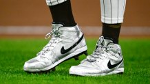 silver Nike cleats
