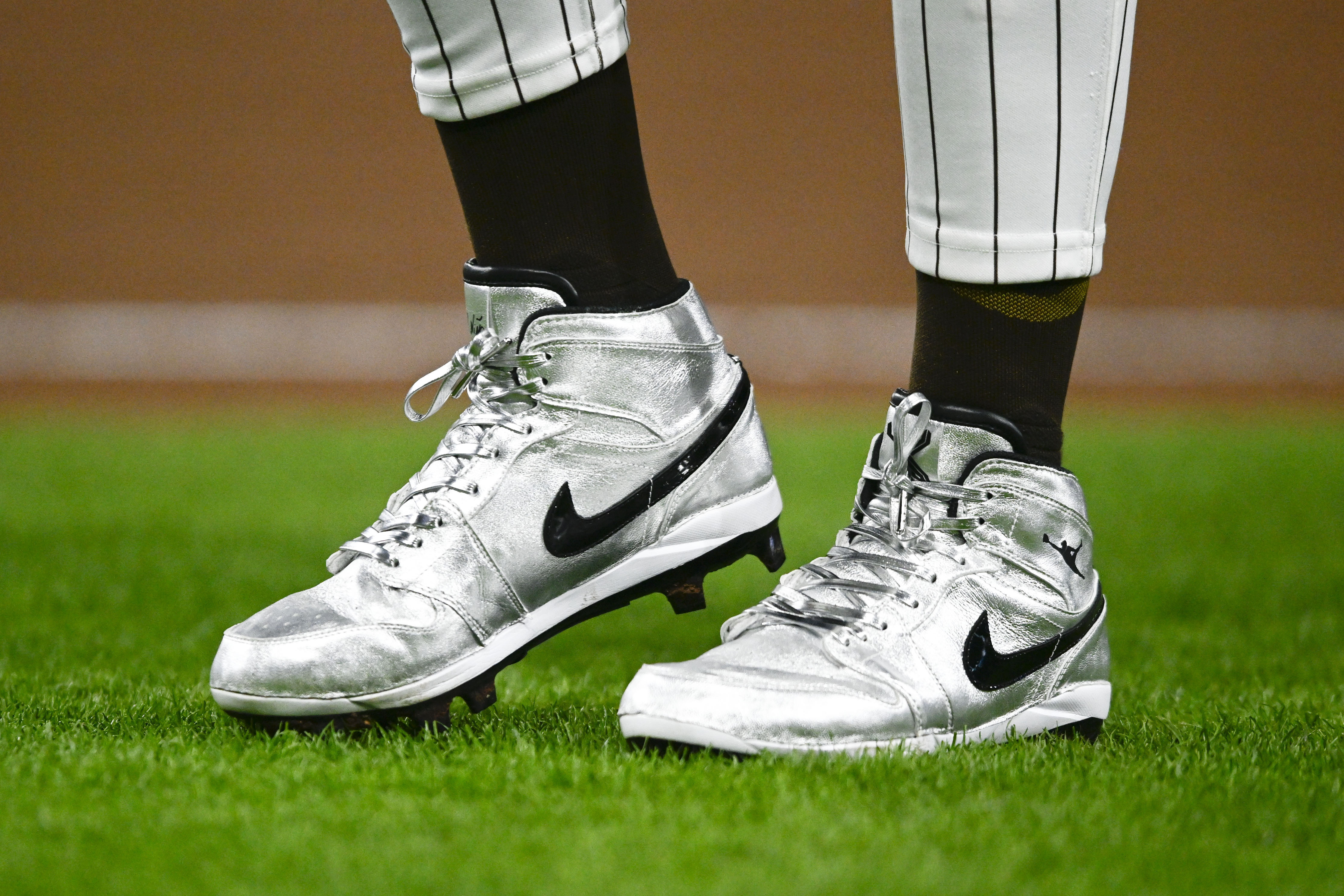 silver Nike cleats