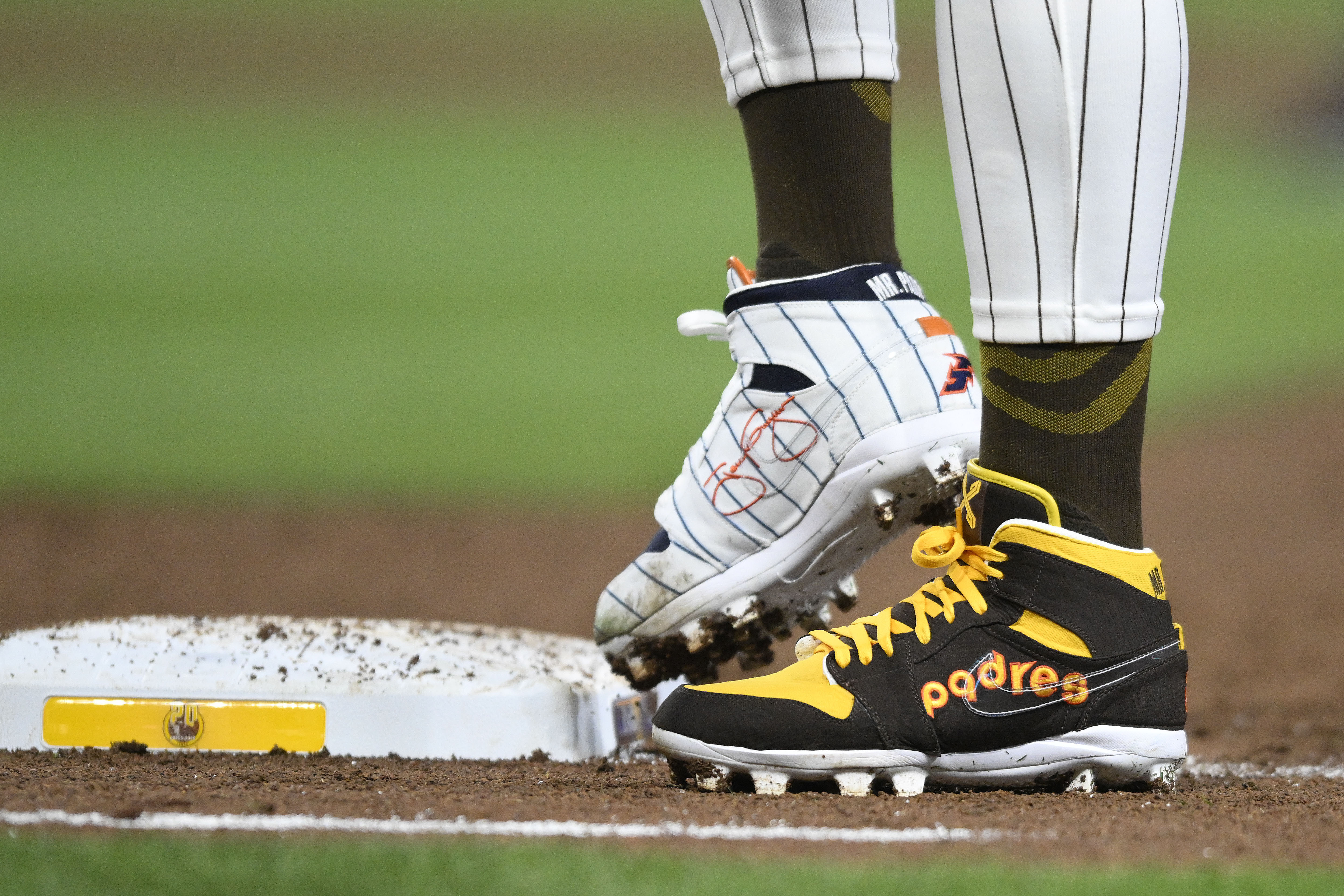 cleats commemorating the Padres's 1980's and 1990's teams