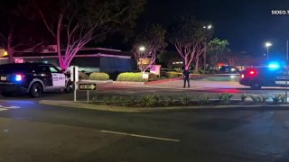 Carlsbad police shoot at suspect who struck officer in the head with a skateboard.