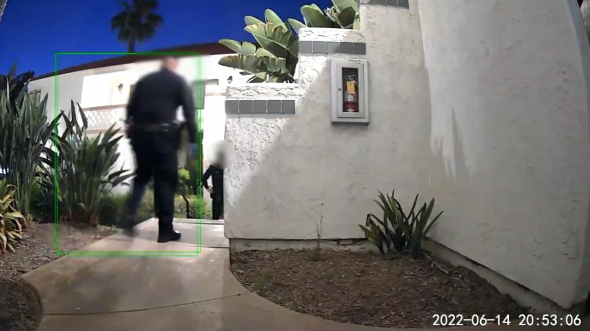 A neighbor's security camera recorded video of police responding to a 911 call about a burglary at Connie Dadkha's Rancho Peñasquitos apartment.