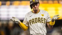 Jackson Merrill of the San Diego Padres shrugs after hitting a single in the sixth inning against the Chicago Cubs on April 8 at Petco Park.