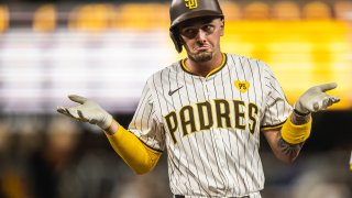 Jackson Merrill of the San Diego Padres shrugs after hitting a single in the sixth inning against the Chicago Cubs on April 8 at Petco Park.