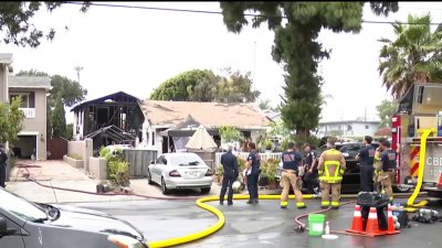 Carlsbad house fire kills 1 person, injures another, closes roads