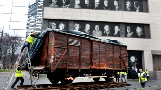 Portraits of Holocaust survivors are displayed at the Museum of Jewish Heritage.