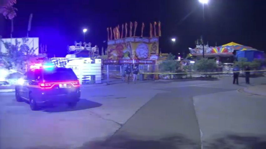 Police investigate after a teen was killed -- and another was hurt -- in a shooting at a carnival outside the Concord Mall in Wilmington, Del. on Saturday night.