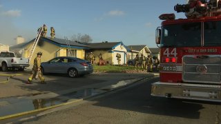 One person was injured in a Mira Mesa house fire on May 8, 2024. (NBC 7 San Diego)