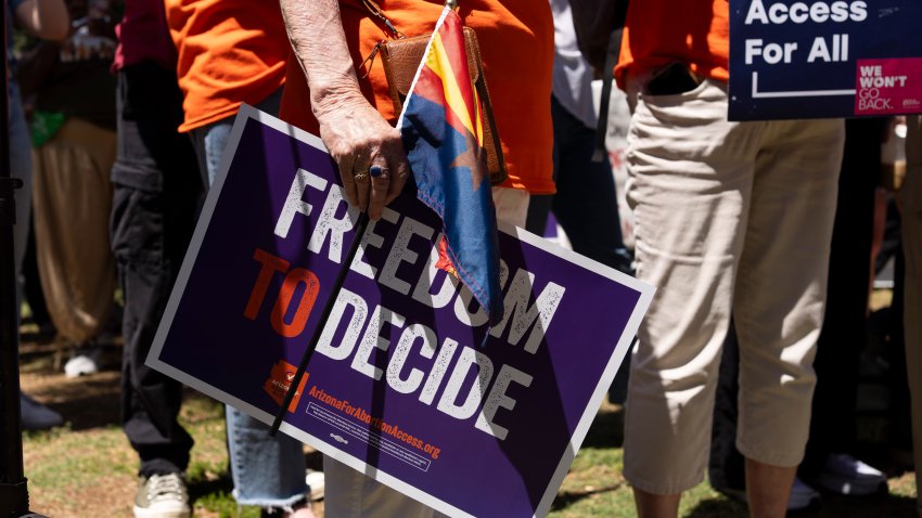 Members of Arizona for Abortion Access, the ballot initiative to enshrine abortion rights in the Arizona State Constitution, hold a press conference and protest condemning Arizona House Republicans and the 1864 abortion ban during a recess from a legislative session at the Arizona House of Representatives on April 17, 2024 in Phoenix, Arizona.