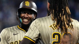 KANSAS CITY, MISSOURI – MAY 31:  Jurickson Profar #10 and Fernando Tatis Jr. #23 of the San Diego Padres talk during a pitching change in the eighth inning against the Kansas City Royals at Kauffman Stadium on May 31, 2024 in Kansas City, Missouri. (Photo by Ed Zurga/Getty Images)