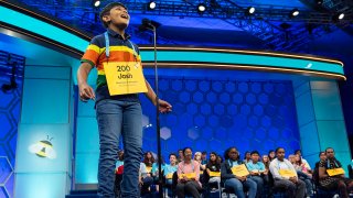 Jashit Verma, 9, of Germantown, Tenn., who also goes by the name Josh, reacts after spelling his word correctly during competition in the Scripps National Spelling Bee, in Oxon Hill, Md., Tuesday, May 28, 2024.