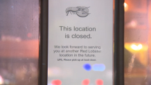 A sign posted on the Red Lobster in San Diego's Mira Mesa neighborhood, which says that the location is now closed.