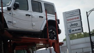 Cars sit on a Chevrolet dealership’s lot on June 20, 2024 in Chicago, Illinois. A cyber attack on CDK Global, a software provider that helps dealerships manage sales and service, has crippled the workflow at approximately 15,000 dealerships across the United States and Canada. 