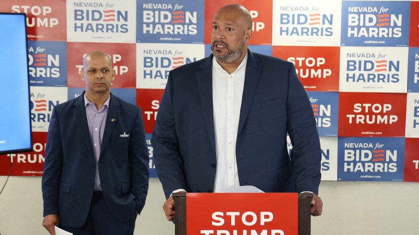 Former US Capitol Police officer Harry Dunn speaks, flanked by former US Capitol Police officer Sgt. Aquilino Gonell,