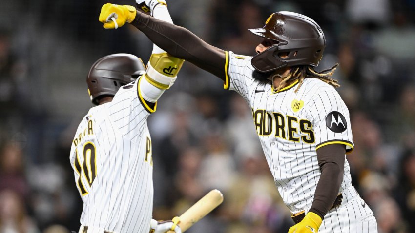 SAN DIEGO, CA – JUNE 10: Fernando Tatis Jr. #23 of the San Diego Padres (R) is congratulated by Jurickson Profar #10 after hitting a solo home run during the fifth inning of a baseball game against the Oakland Athletics June 10, 2024 at Petco Park in San Diego, California. (Photo by Denis Poroy/Getty Images)