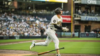SAN DIEGO, CALIFORNIA – JUNE 20: Jackson Merrill #3 of the San Diego Padres celebrates after hitting a home run in the first inning against the Milwaukee Brewers at Petco Park on June 20, 2024 in San Diego, California. (Photo by Matt Thomas/San Diego Padres/Getty Images)