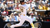 SAN DIEGO, CA – JUNE 26:  Kyle Higashioka #20 of the San Diego Padres hits a two-run home run during the second inning of a baseball game against the San Diego Padres June 26, 2024 at Petco Park in San Diego, California. (Photo by Denis Poroy/Getty Images)