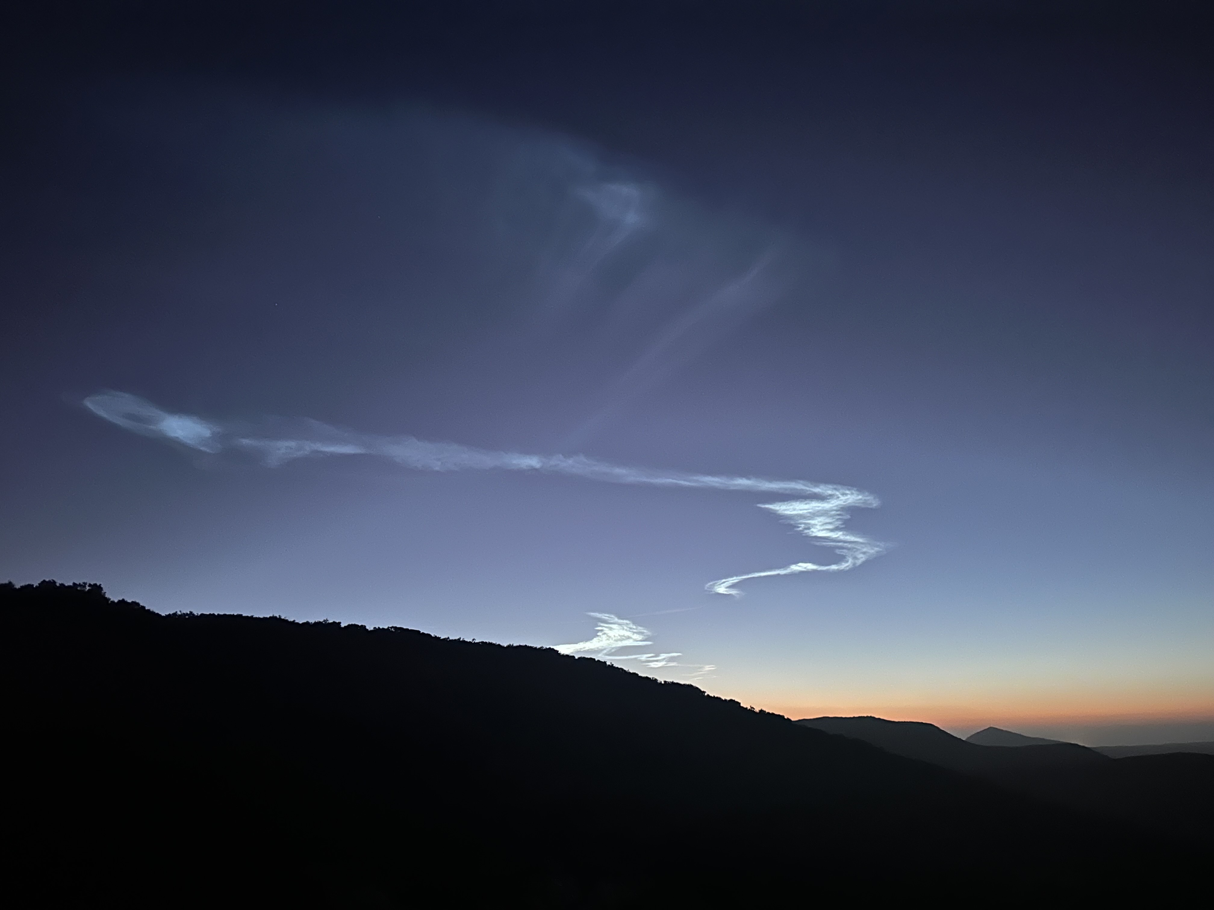 The SpaceX Falcon 9 rocket launch seen from Cowles Mountain on June 28, 2024.