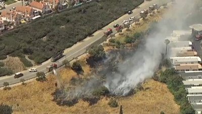 Firefighters make water drops on Spring Valley fire