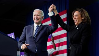 U.S. President Joe Biden and Vice President Kamala Harris stand on stage together after delivering remarks at the DNC 2023 Winter Meeting in Philadelphia, Pennsylvania, U.S., February 3, 2023.