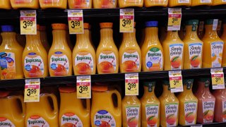 Orange juice is offered for sale at a grocery store on February 13, 2024 in Chicago, Illinois.ย