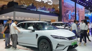 Spectators are looking at BYD Song L electric cars at the 21st Changchun International Automobile Expo in Changchun, Jilin province, China, on July 17, 2024. (Photo by Costfoto/NurPhoto via Getty Images)