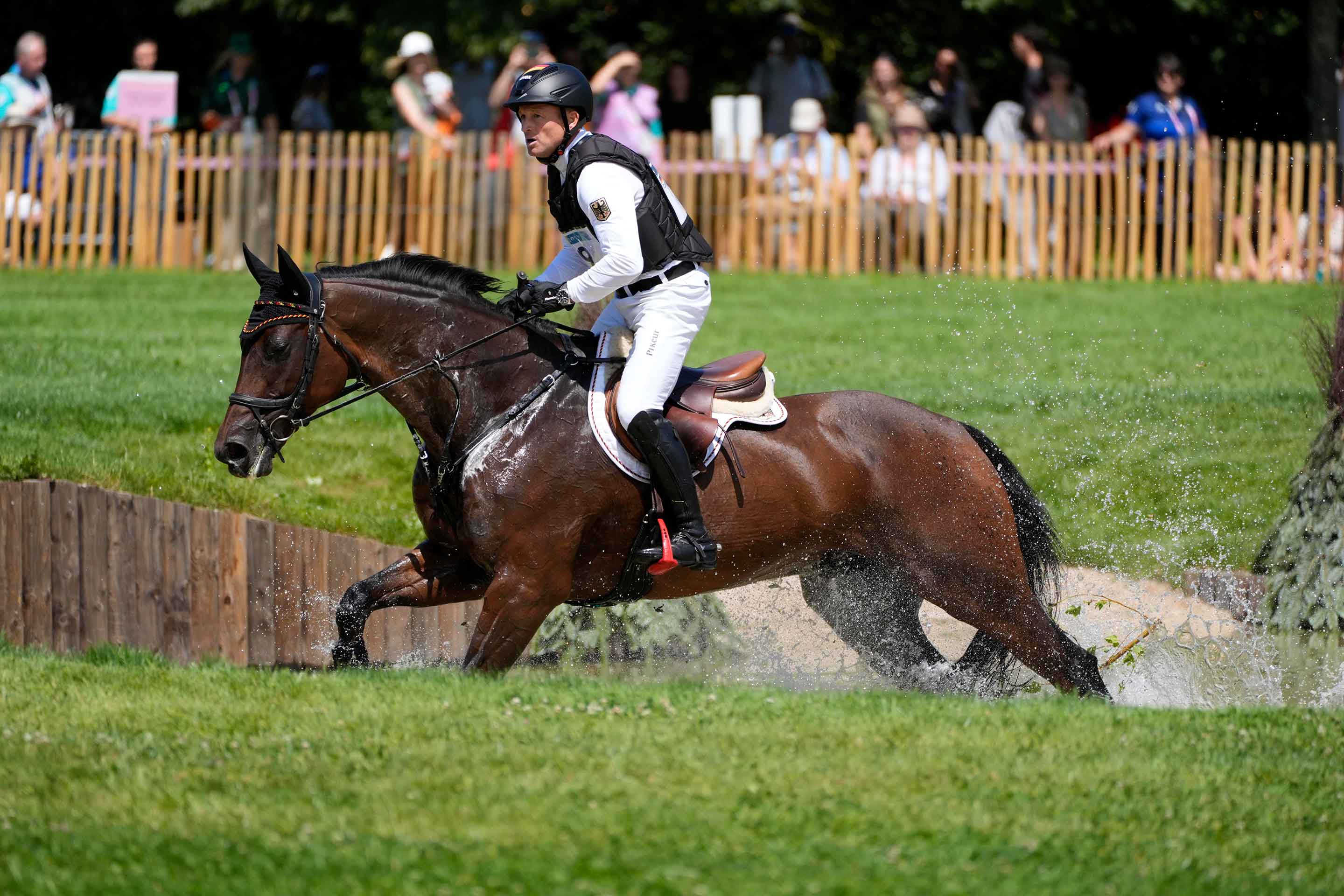 Olympic riders gallop in the Versailles Palace gardens NBC 7 San Diego