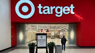 A shopper heads into a Target store