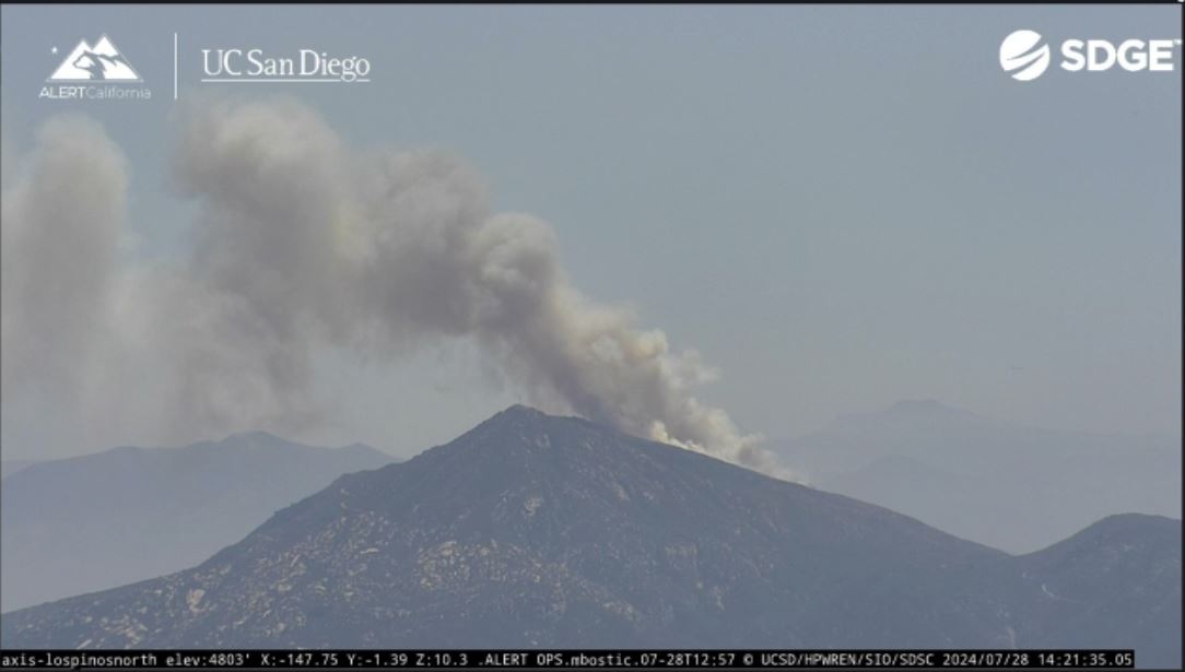 A brush fire was burning near the US-Mexico border