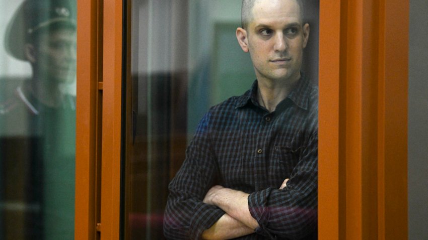 FILE – Wall Street Journal reporter Evan Gershkovich stands in a glass cage in a courtroom in Yekaterinburg, Russia, Wednesday, June 26, 2024. Court officials say closing arguments in the espionage trial of U.S. journalist Evan Gershkovich will be held Friday, July 19, 2024, as the proceedings picked up speed in a case that has seen the reporter held in pre-trial custody for over a year. (AP Photo, File)