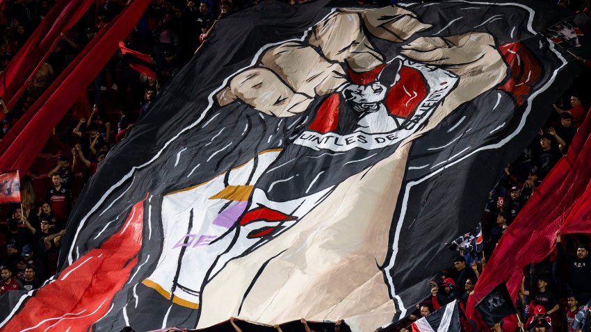 TIJUANA, MEXICO – APRIL 19: A giant flag of Xolos is displayed during the 16th round match between Tijuana and Puebla as part of the Torneo Clausura 2024 Liga MX at Caliente Stadium on April 19, 2024 in Tijuana, Mexico.(Photo by Francisco Vega/Getty Images)