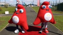 PARIS, FRANCE - APRIL 23: Phryge mascots pose ahead of the presentation of the preparations for the upcoming Paris 2024 Olympic Games at Airport Roissy Charles de Gaulle on April 23, 2024 in Paris, France. (Photo by Marc Piasecki/Getty Images)