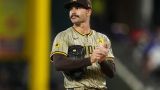 ARLINGTON, TEXAS – JULY 02: Dylan Cease #84 of the San Diego Padres rubs his hands on a baseball during the first inning against the Texas Rangers at Globe Life Field on July 02, 2024 in Arlington, Texas. (Photo by Sam Hodde/Getty Images)