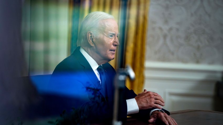 US President Joe Biden delivers a prime-time address to the nation in the Oval Office of the White House in Washington, DC, US, on Sunday, July 14, 2024. The stakes in this election are high and it’s time to cool down the political rhetoric, President Joe Biden said in an address from Oval Office. Photographer: Bonnie Cash/UPI/Bloomberg via Getty Images