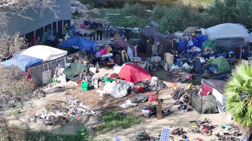 Drone video captures large homeless encampment under I-5 near SeaWorld ...