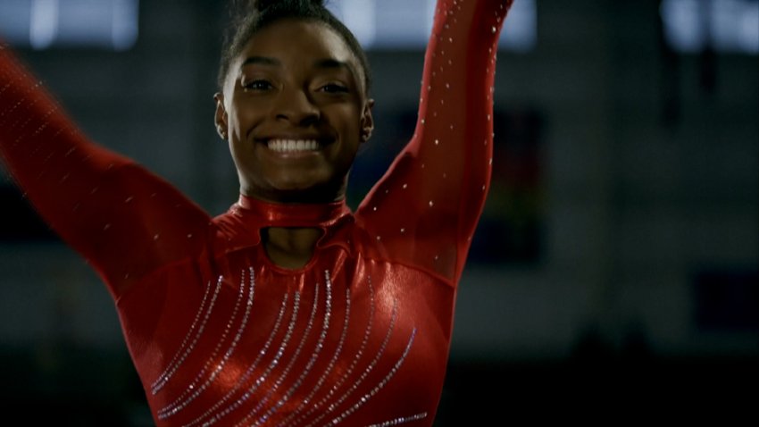 How does Simone Biles pull off her record-breaking gymnastics feats?