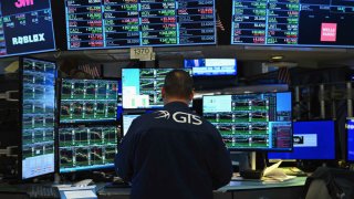 A trader works on the floor of the New York Stock Exchange (NYSE) during morning trading on March 4, 2024 in New York City. 