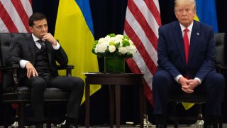 U.S. President Donald Trump and Ukrainian President Volodymyr Zelensky looks on during a meeting in New York on September 25, 2019, on the sidelines of the United Nations General Assembly. 