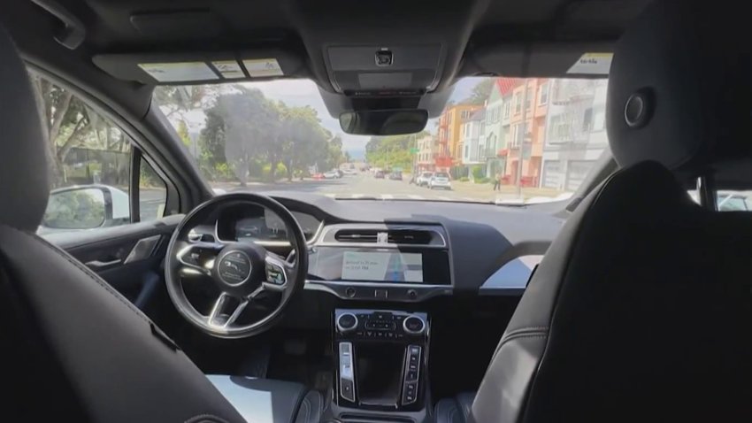 Inside of a Waymo self-driving car.