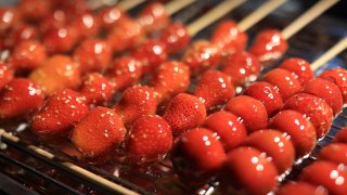 Sugarcoated strawberries on a stick