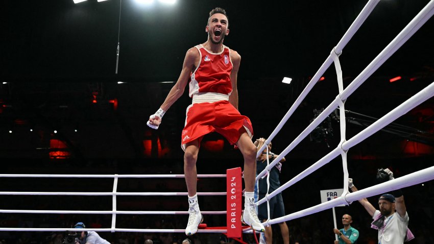 France’s Billal Bennama reacts after beating Dominican Republic’s Yunior Alcantara Reyes in the men’s 51kg semi-final boxing match during the Paris 2024 Olympic Games at the North Paris Arena, in Villepinte on August 4, 2024. (Photo by MOHD RASFAN/AFP via Getty Images)