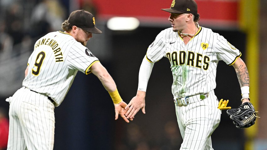 SAN DIEGO, CA – AUGUST 12: Jake Cronenworth #9 of the San Diego Padres and Jackson Merrill #3 celebrate a 2-1 win over the Pittsburgh Pirates August 12, 2024 at Petco Park in San Diego, California. (Photo by Denis Poroy/Getty Images)