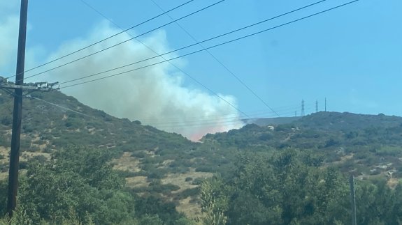 Spring Valley brush fire stopped at 20 acres, all evacuations lifted ...