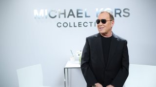 Designer Michael Kors poses backstage before the Michael Kors Collection Fall 2017 runway show at Spring Studios in New York City on Feb. 15, 2017.