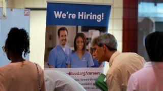 Job seekers attends the JobNewsUSA.com South Florida Job Fair held at the Amerant Bank Arena in Sunrise, Florida, on June 26, 2024.