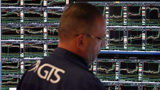 A trader works on the floor at The New York Stock Exchange following the Federal Reserve rate announcement on Sept. 18, 2024.