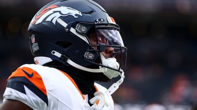 Broncos RB Tyler Badie carted off sidelines after helmet to the back