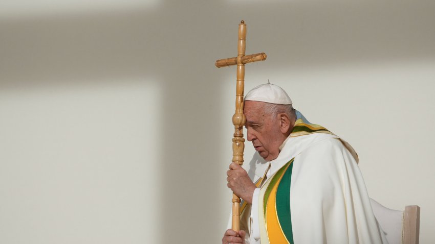 Pope Francis holds the pastoral staff as he presides over the Sunday mass at King Baudouin Stadium, in Brussels Sunday, Sept. 29, 2024.